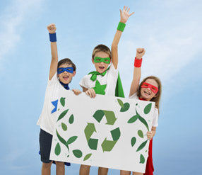 Kids holding a recycling poster