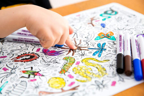 Kid colouring in with eco colouring set