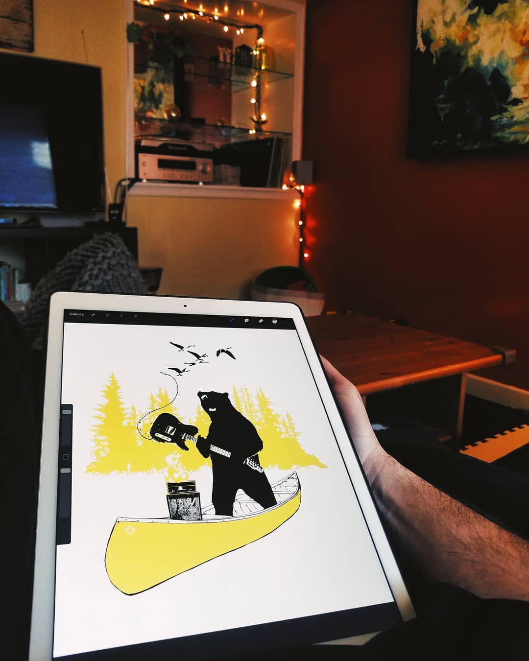 Drawing of a bear with a guitar on an iPad