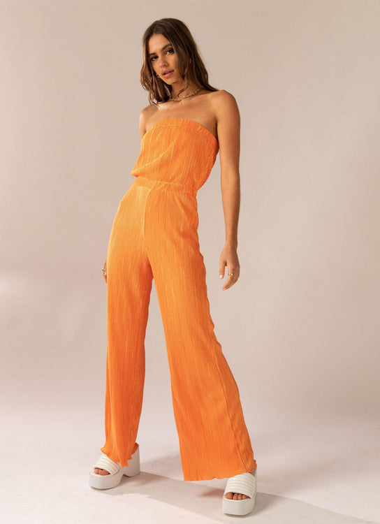 Cassie Ruffle Jumpsuit - Tangerine  Ruffle jumpsuit, Orange jumpsuit,  Jumpsuit
