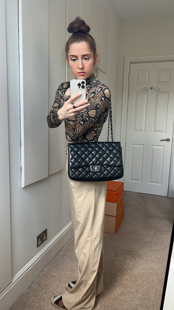 chanel east west flap bag caviar