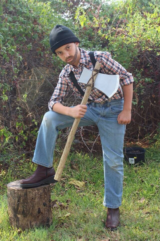 lumberjack Halloween costume with axe made from cardboard mailing tubes
