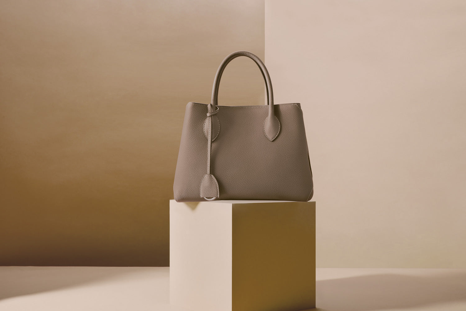 The minimalist and elegant Mia Tote Bag in the timeless color Etoupe.