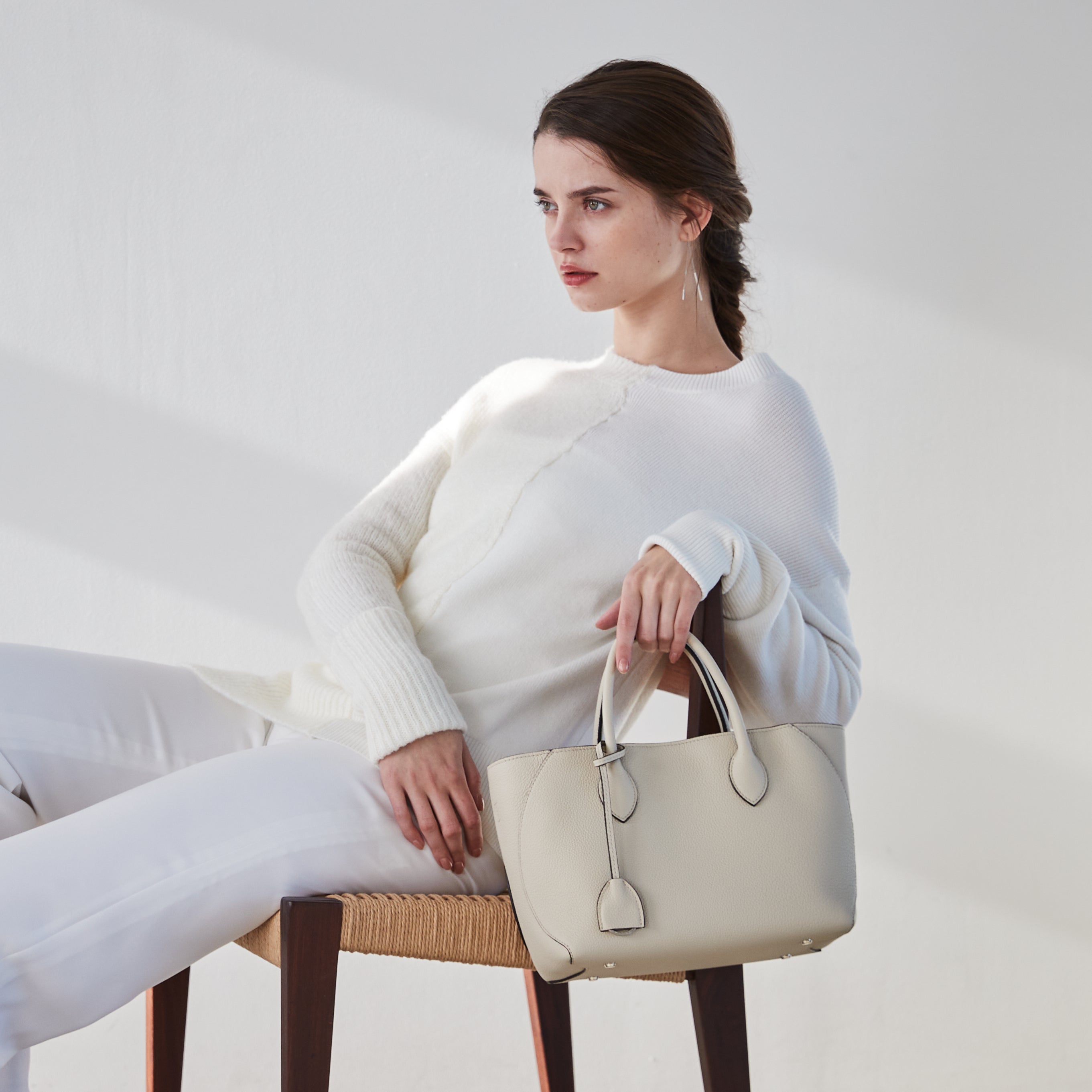 The timeless design of the Mia Tote Bag in Ivory complements any outfit.