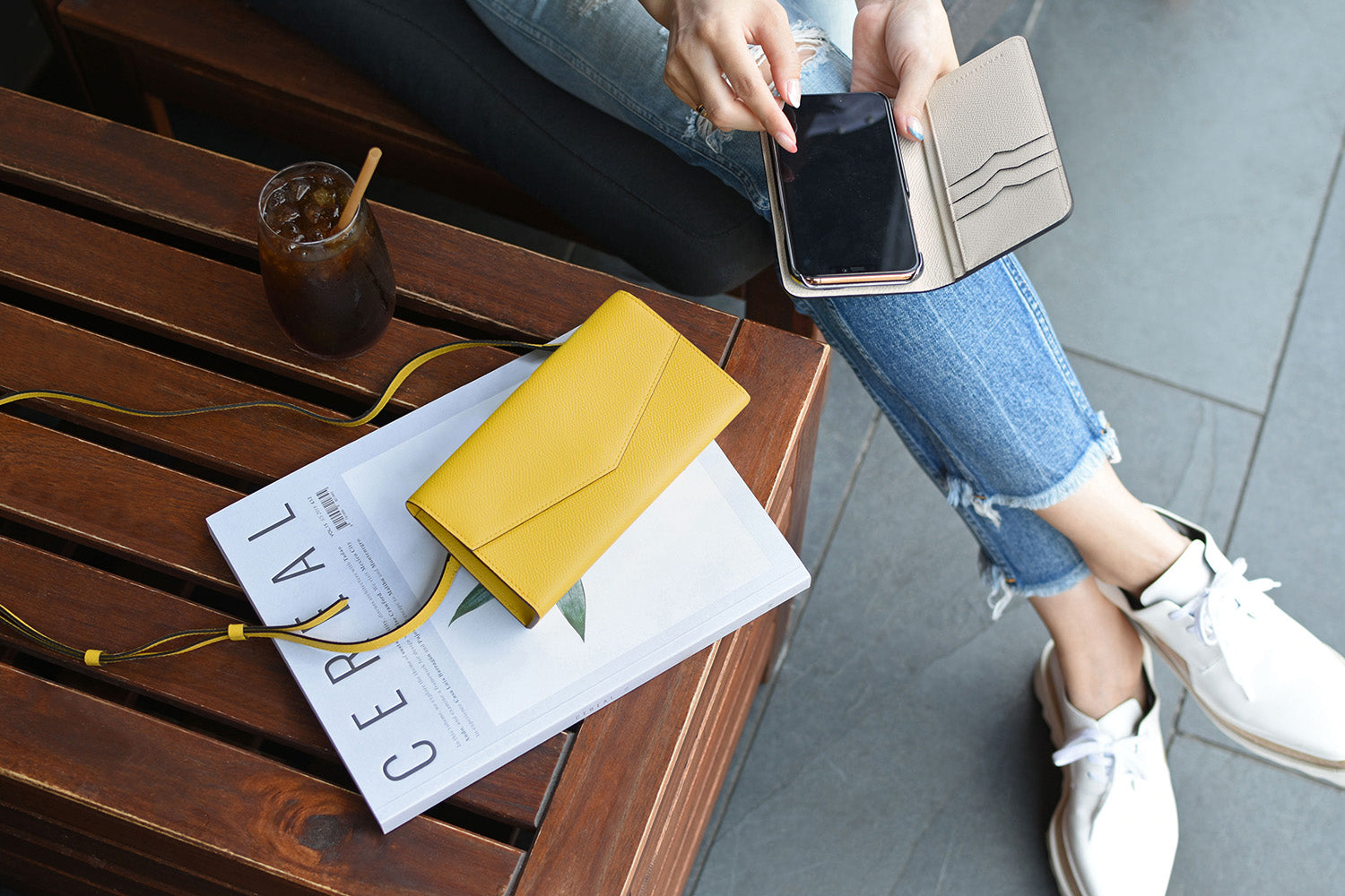 A colorful and modern crossbody waist bag in the summery color yellow made of full-grain leather.