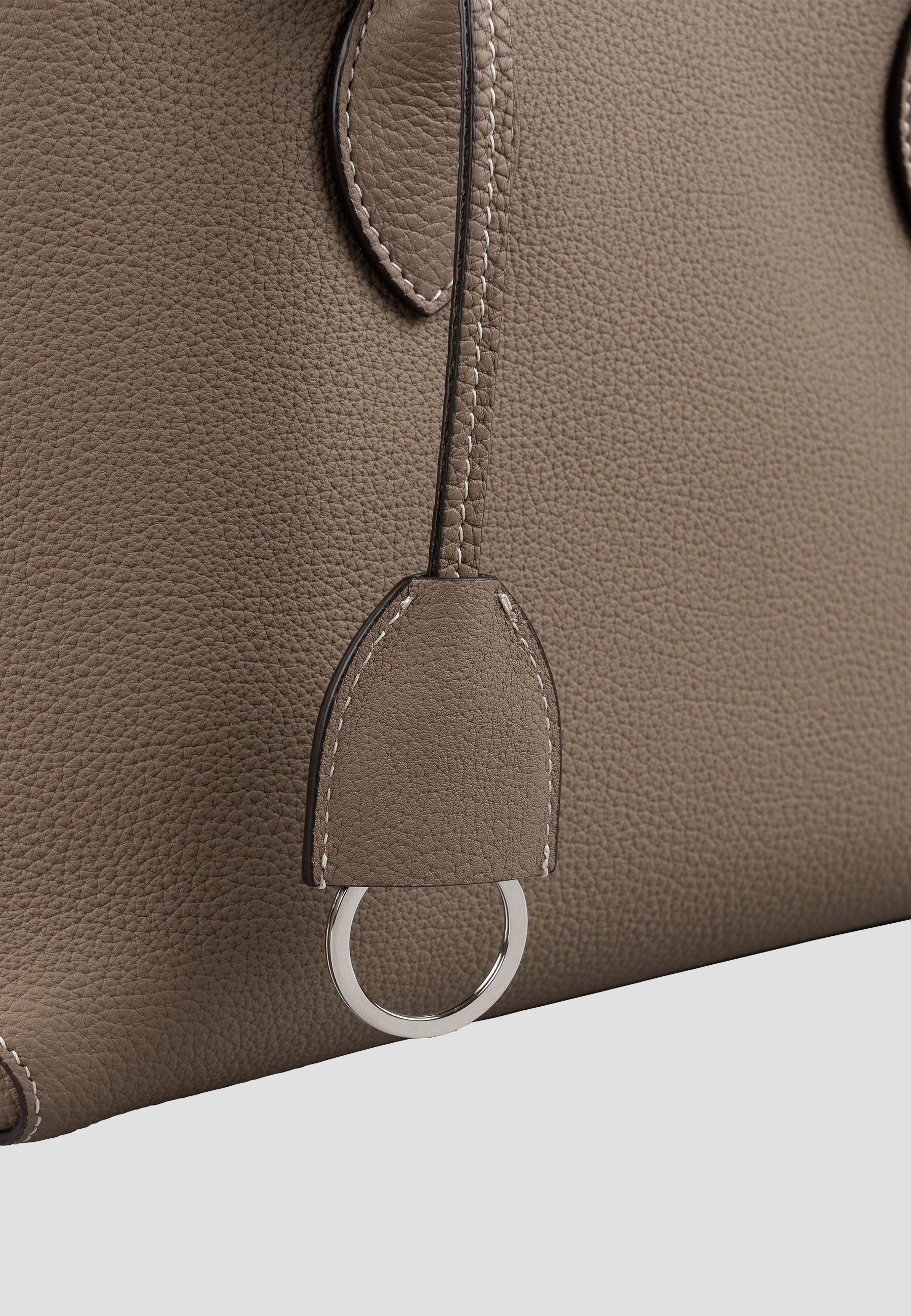 Close-up detail of the natural grain and texture of high-quality full grain leather.