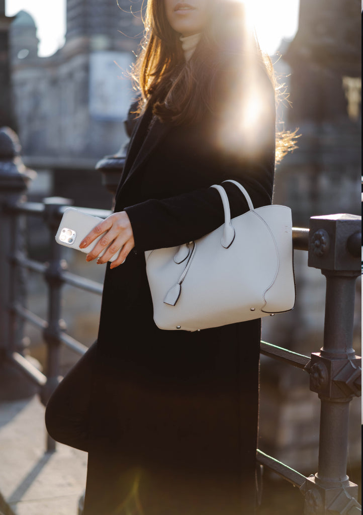 Pristine White Bags Are The Polished Arm Candy Of The Moment | Vogue