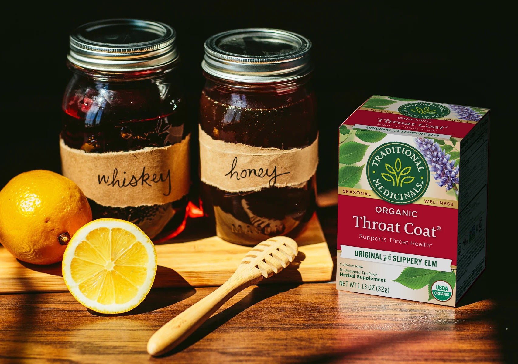 Hot Toddy ingredients with Throat Coat tea box on table