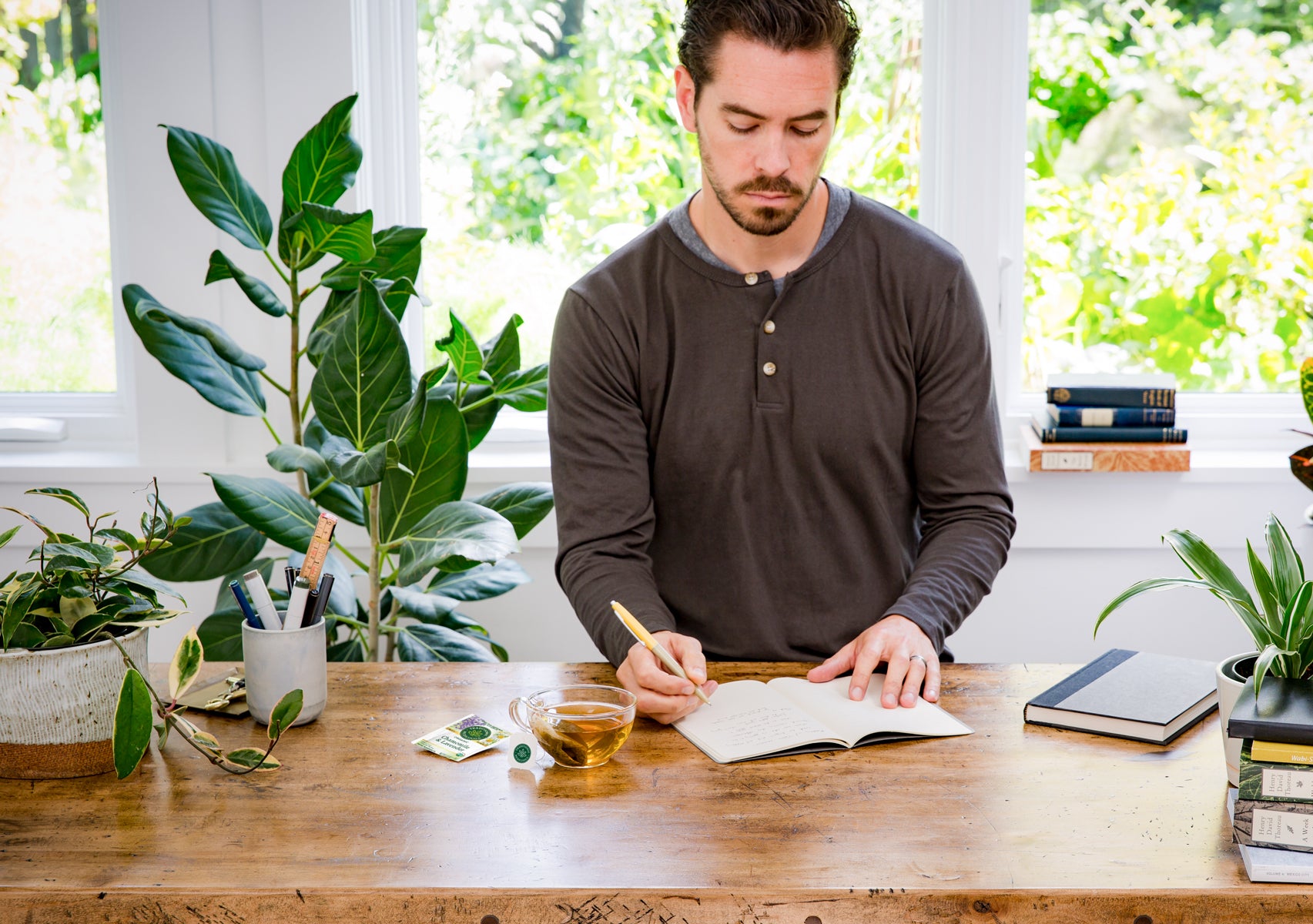 man tending to plants