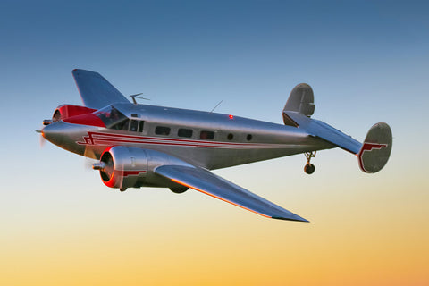 Beech 18 at sunset