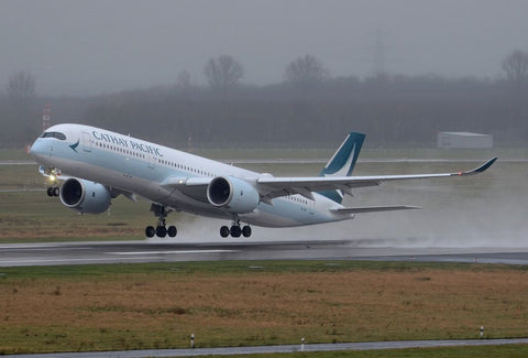 Cathay Pacific A350 rainy runway touchdown