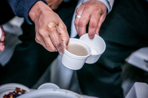 But Is It Safe? Two men, toasting kava drinks. 