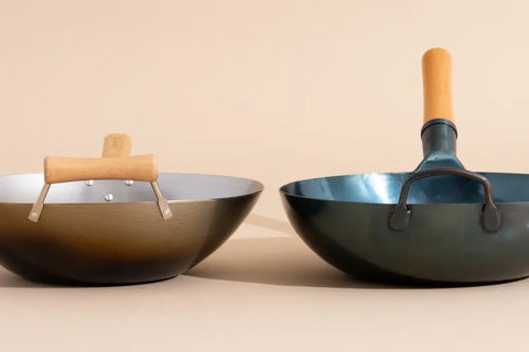 Two woks sitting side by side for comparison