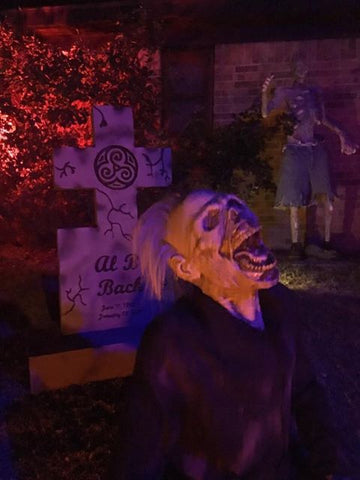 Deathrising prop by Distortions in a cemetery scene for a home yard haunt during Halloween
