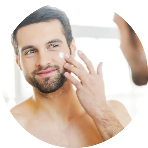 men applying face cream