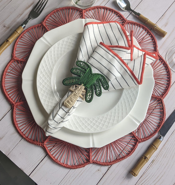 Red handwoven scalloped placemat table setting