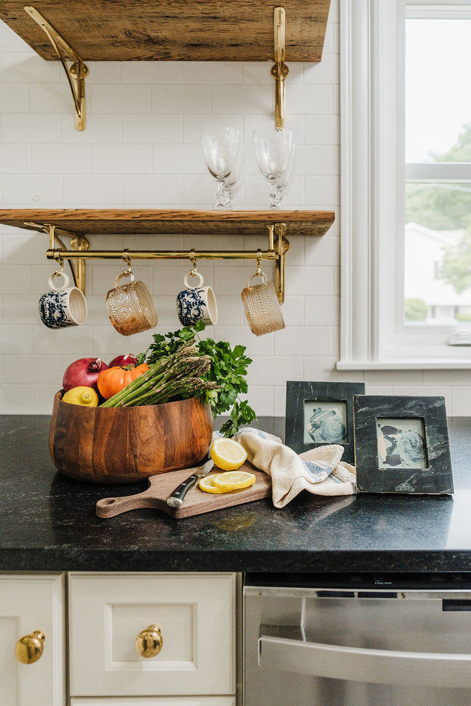 Abstract Paintings "Dugan Brook" and "Angiers Pond" by Christine Dore Trant on kitchen counter with produce bowl