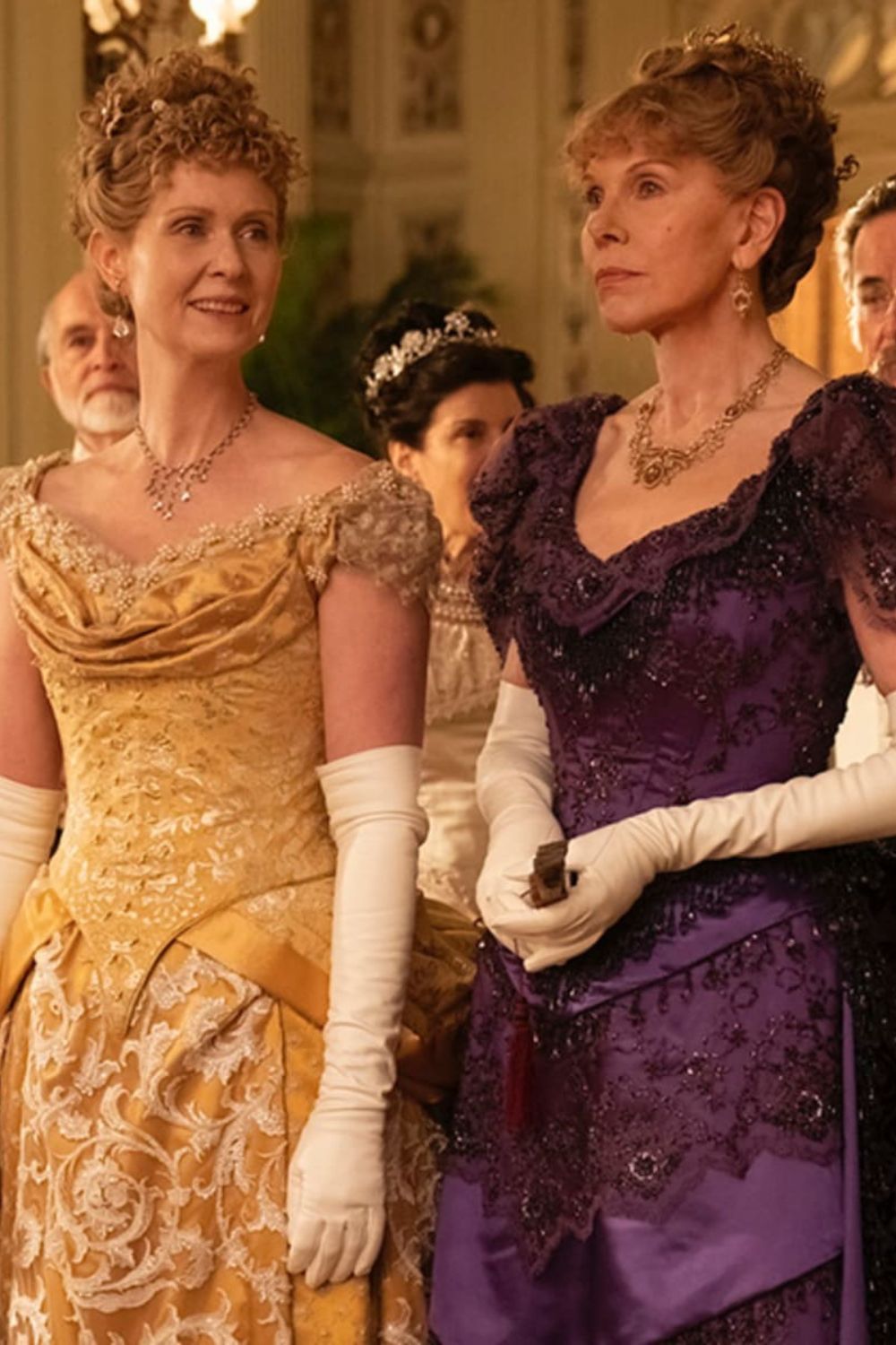 Still photo of two women in ornate ballroom attire from HBO's series The Gilded Age