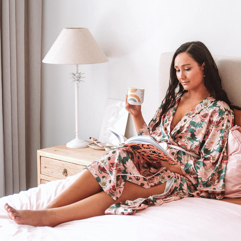 Lounging in bed with luxurious maxi satin robes australia