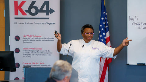 African american chef presenting to audience