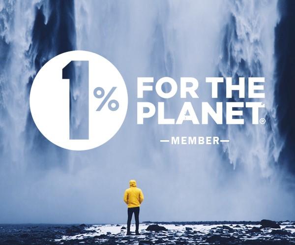 1% for the Planet - man standing in front of a big waterfall