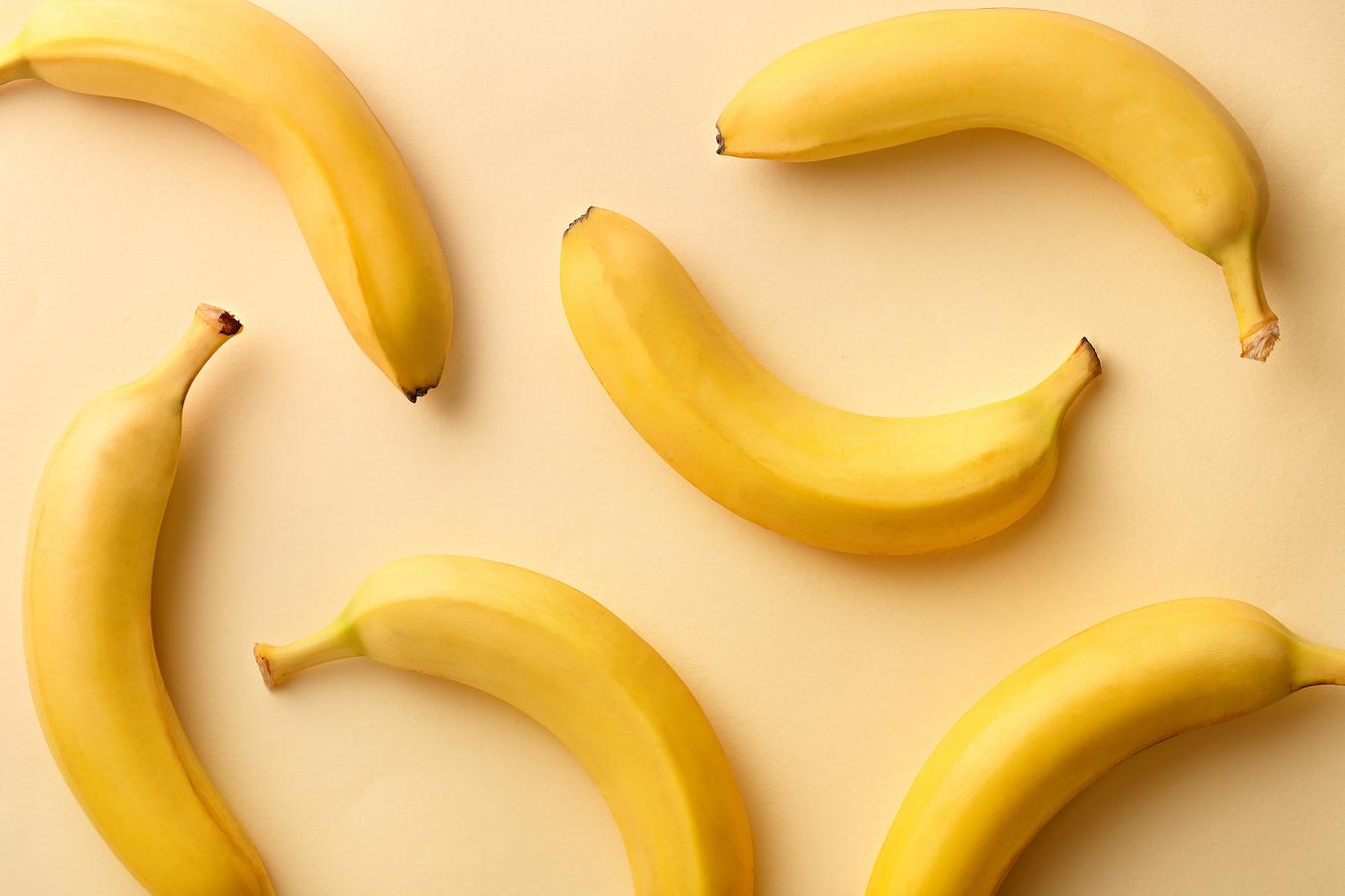 a group of bananas food intolerance upset stomach human health intestinal microbiome bowel movements processed foods