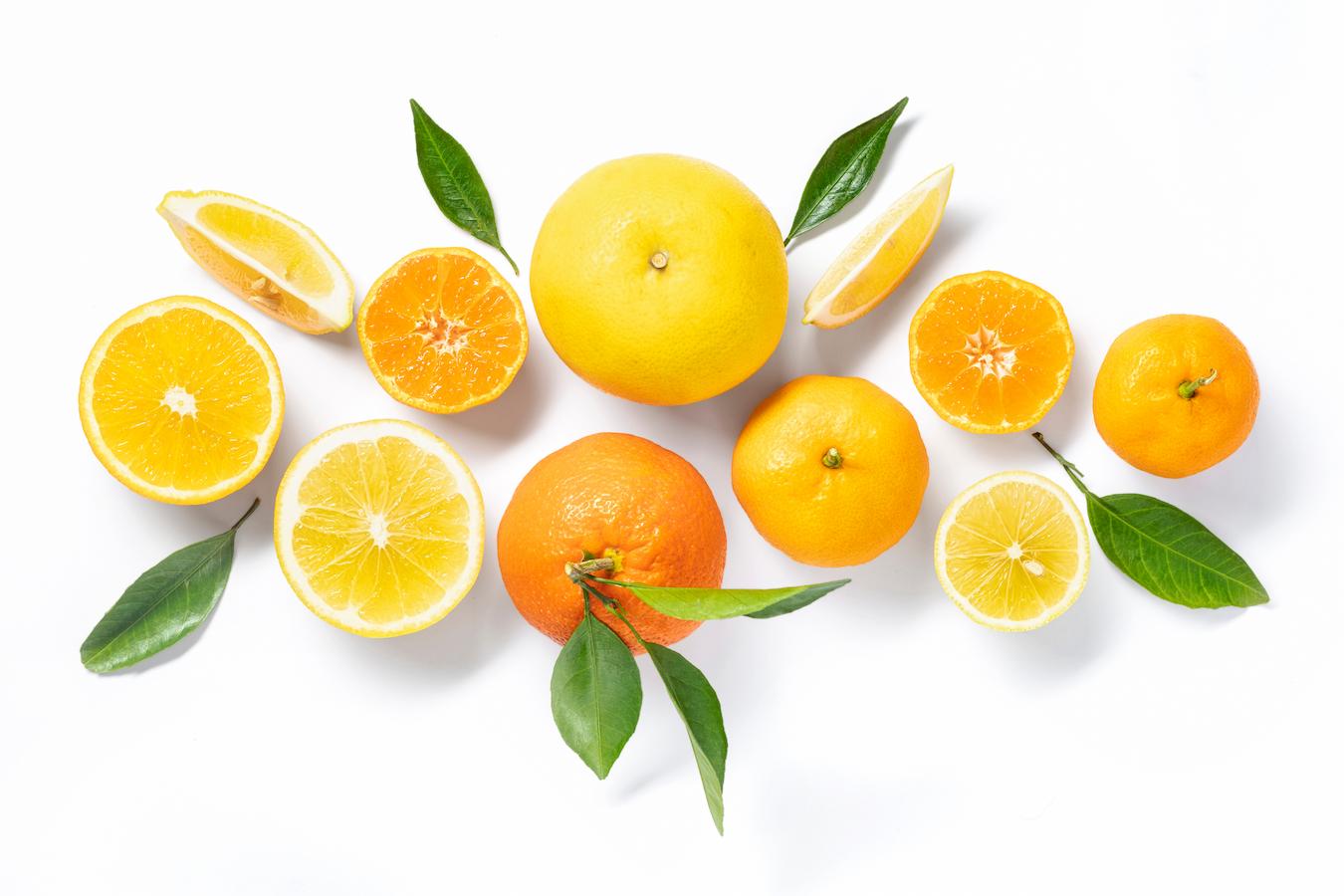 oranges and lemons on a white background green tea fermented vegetables body produces stay healthy