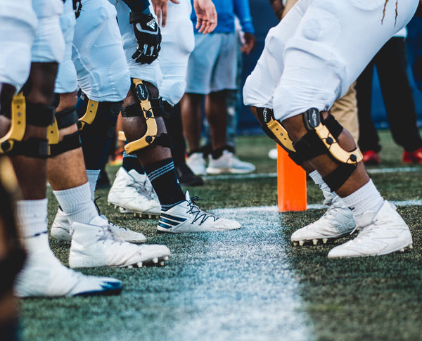 Football players getting lined up