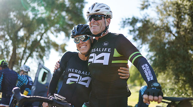 Elite triathlete Heather Jackson (left) and Michael at a recent cycling event.