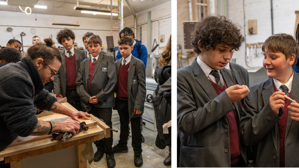 Students tour Goldfinger’s furniture workshop.