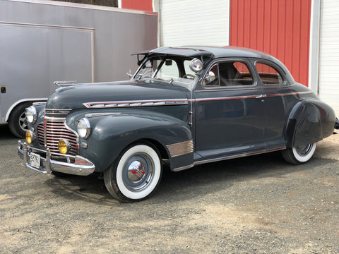 Grey antique car with new visor