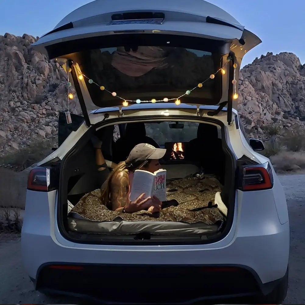 The Tesla Model 3 mattress fits perfectly within the frunk and the trunk.
