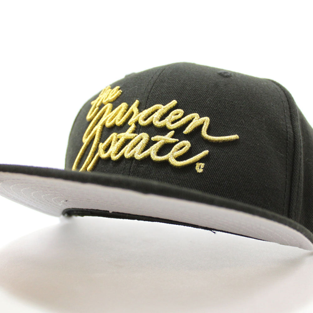 black and gold fitted