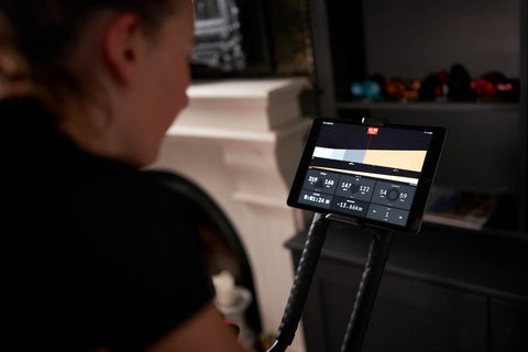 a close up of a smart device connected to a Wattbike completing an indoor cycling route