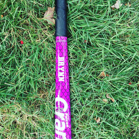 Field hockey stick labeled