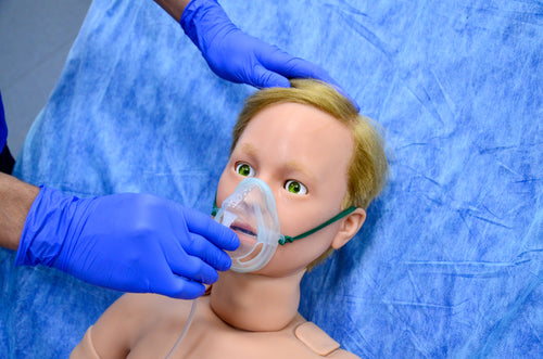 Arthur Paediatric Patient Simulator wearing an oxygen mask