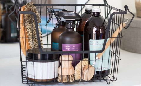 basket with eco-friendly cleaning products 