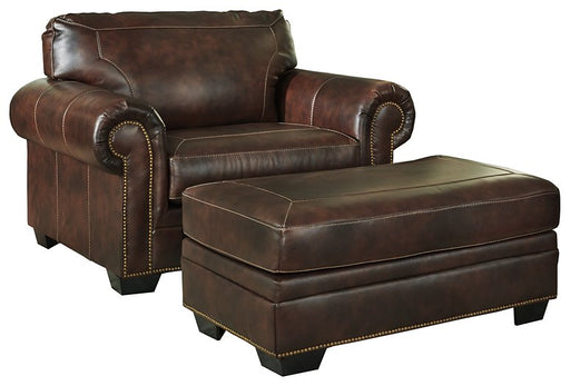 oversized club chairs with ottomans