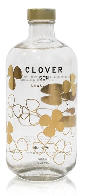 Clear bottle of Lucky N4 Clover Gin with gold lucky clover leaf design