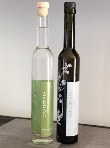 Bottle of Absinthia absinthe blanche and bottle of absinthia's absinthe verte