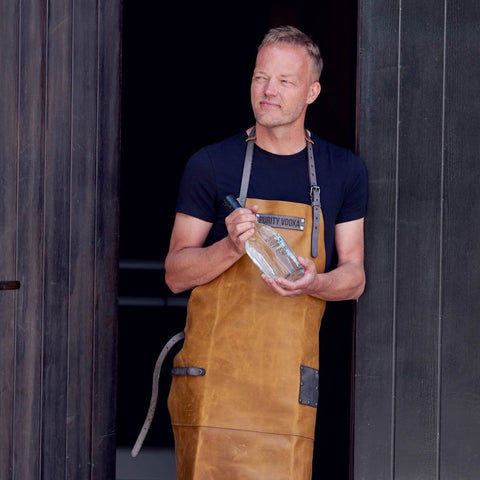 Stefan Magnusson, master distillery of purity distillery, holding a bottle of purity vodka