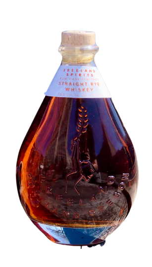 Teardrop shaped deep brown corked straight rye whiskey bottle from Freeland Spirits, as featured on Tipxy.com