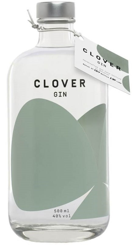 Clear bottle of Clover Gin with pastel green design and silver topper