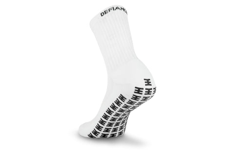 White sports grip sock with black silicon grips 