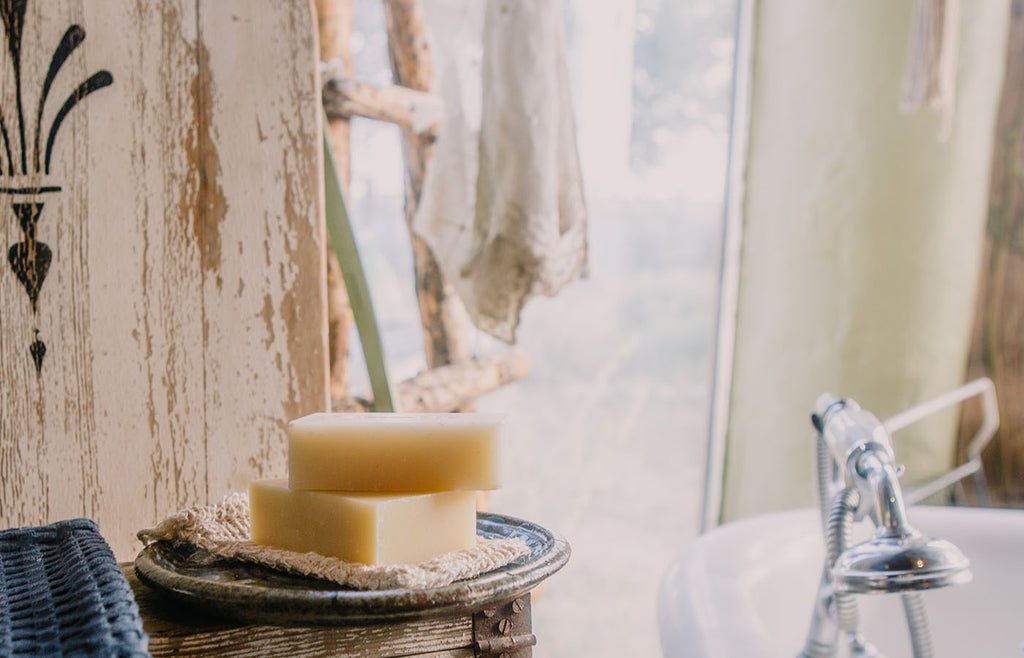 Soap bars in a clean, bohemian style bathroom