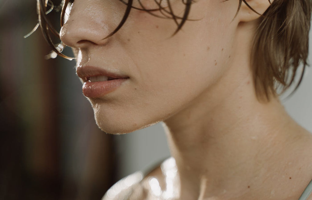 Close up of a woman's sweaty face