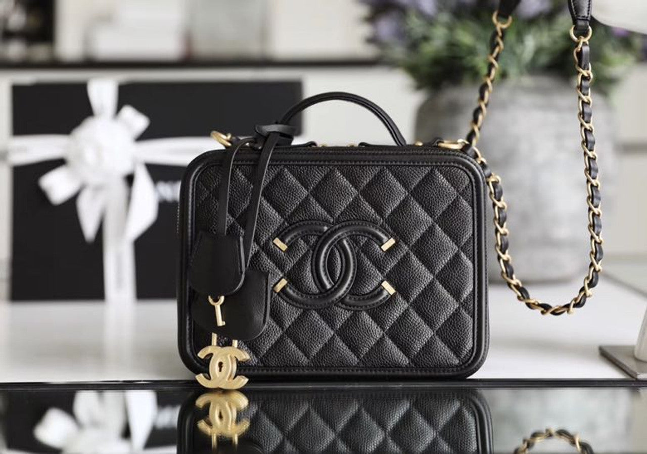 Chanel CC Filigree Vanity Case: From Cosmetics to Fashion Statement –  LuxUness