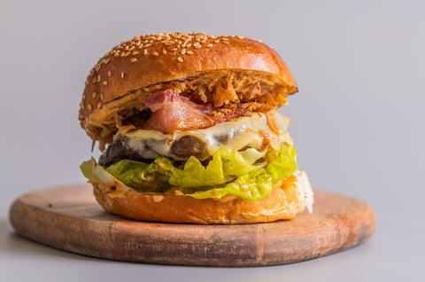 Wagyu beef burger with salad, bacon and cheese