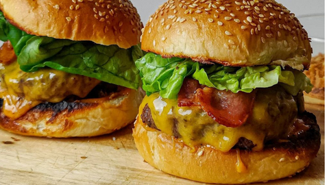 two waagyu burgers side by side