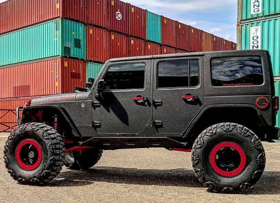 2016 Jeep Wrangler with red tire rims